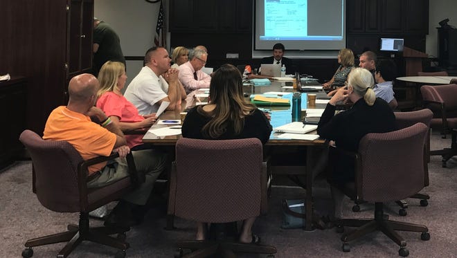 The Toms River Board of Education and senior administration officials at a budget and finance committee meeting last week.