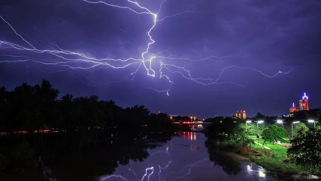 A lightning bolt strikes in Culiacan, Sinaloa State, Mexico, early on Aug. 18, 2018. 
