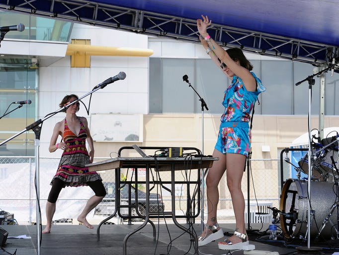 Marissa Guzman, right, and her dancing accompaniment