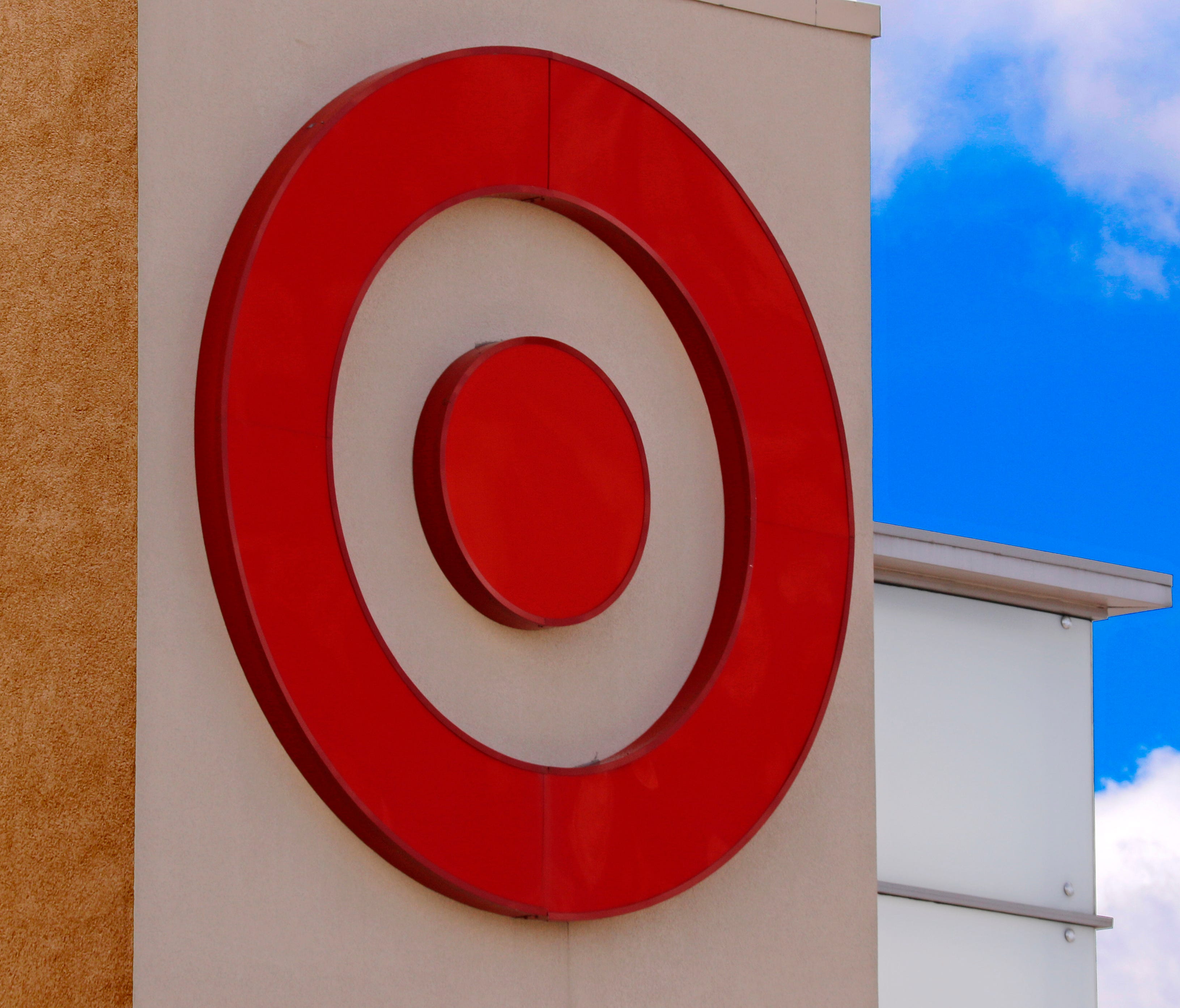 This May 3, 2017, photo shows the Target logo on a store in Upper Saint Clair, Pa. Target is jumping into voice-activated shopping as it deepens its relationship with Google, offering thousands of items found in the store except for perishables like 