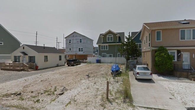 This Google Street View image shows the approximate location of 207 Durborow Avenue in Toms River. The property at this address changed hands in April 2019, when John and Pamela Caucino bought the property from Q D Salamandra and L Matthews for $250,000.