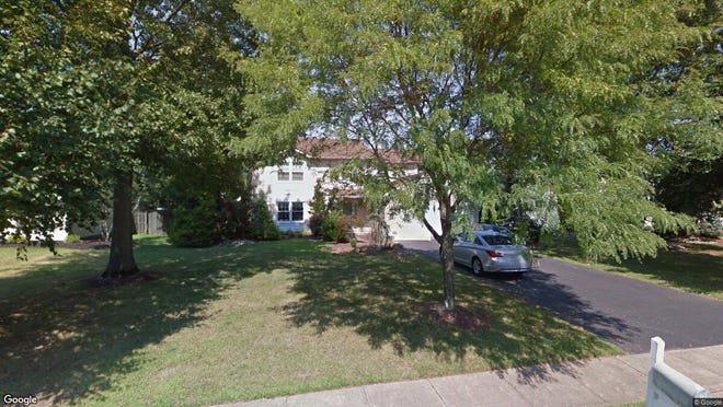 This Google Street View image shows the approximate location of 8 Regal Road in Manalapan. The property at this address changed hands in May 2019, when Christopher and Marisa Holliday  bought the property from Steven and Susan Morris  for $490,000.