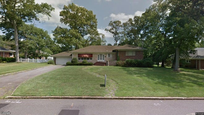 This Google Street View image shows the approximate location of 303 Lexington Ave{dot} in Toms River. The property at this address changed hands in May 2019, when Gregory A and Gail G Runion  bought the property from  Rose Estate Esposito  for $390,000.