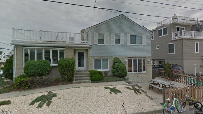 This Google Street View image shows the approximate location of 101 E. Mermaid Lane in Long Beach Township. The property at this address changed hands in May 2019, when Richard D and Lindsey A Martinelli bought the property from James B and Deborah Hopper and others for $955,000.