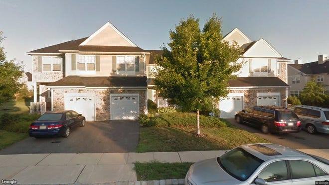 This Google Street View image shows the approximate location of 55 Scarlet Oak Drive in Montgomery. The property at this address changed hands in June 2019, when Sam and Yuanyuan Li bought the property from Kiran Kumar Battina for $437,000.