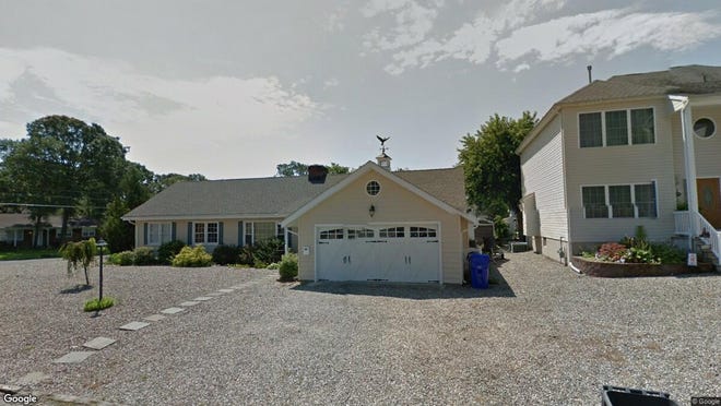 This Google Street View image shows the approximate location of 51 Nina Court in Brick. The property at this address changed hands in May 2019, when Samir A and Isabel G Hage bought the property from Scott E and Linda C Symons for $580,000.
