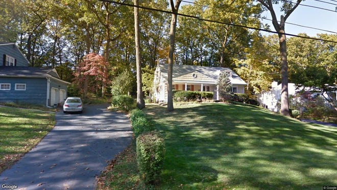 This Google Street View image shows the approximate location of 039 Woodland Ave. in Mountain Lakes. The property at this address changed hands in June 2019, when Lawrence and Tara Bischoff bought the property from Faizulla and Dietlind Kathawala for $580,000.