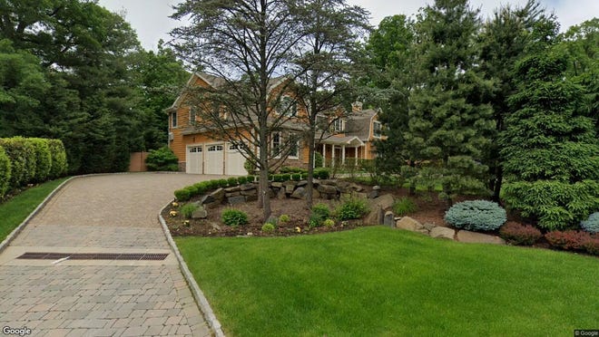 This Google Street View image shows the approximate location of 298 Woodland St. in Tenafly. The property at this address changed hands in May 2019, when new owner bought the property for $1,725,000.