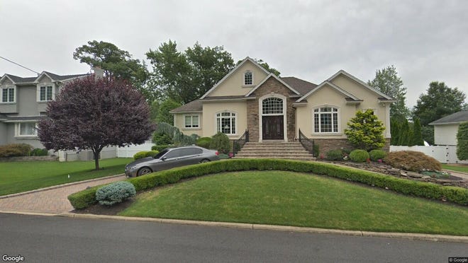 This Google Street View image shows the approximate location of 115 Longview Drive in Emerson. The property at this address changed hands in July 2019, when new owners bought the property for $975,000.