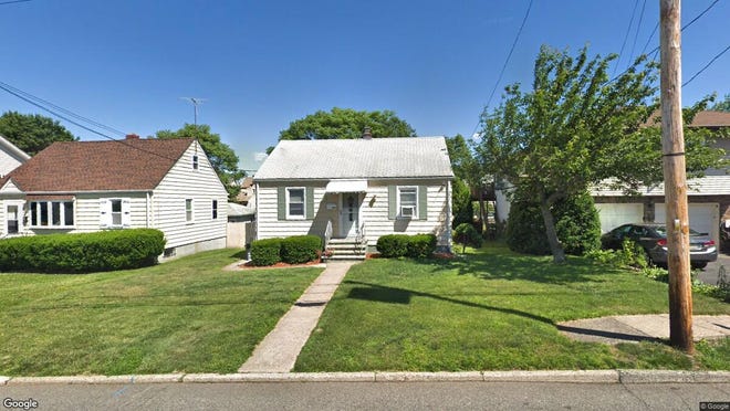 This Google Street View image shows the approximate location of 397 Van Bussum Ave. in Garfield City. The property at this address changed hands in May 2019, when new owners bought the property for $255,000.