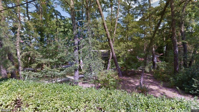 This Google Street View image shows the approximate location of 25 Elm Drive in Medford. The property at this address changed hands in August 2019, when new owner bought the property for $330,000.
