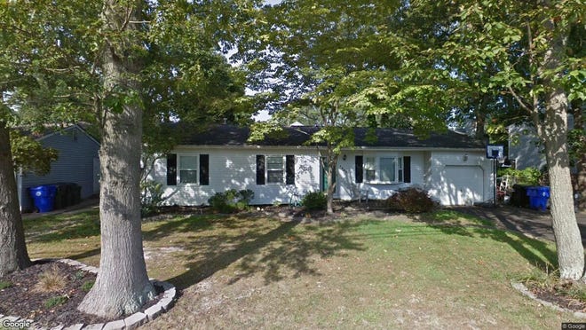 This Google Street View image shows the approximate location of 1450 Green Grove Road in Brick. The property at this address changed hands in June 2019, when new owners bought the property for $283,000.