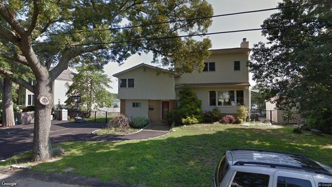 This Google Street View image shows the approximate location of 618 Harbor Road in Brick. The property at this address changed hands in June 2019, when new owners bought the property for $615,000.
