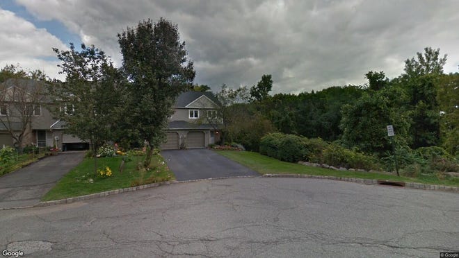 This Google Street View image shows the approximate location of 26 Guilford Court in Parsippany-Troy Hills. The property at this address changed hands in August 2019, when new owners bought the property for $460,000.