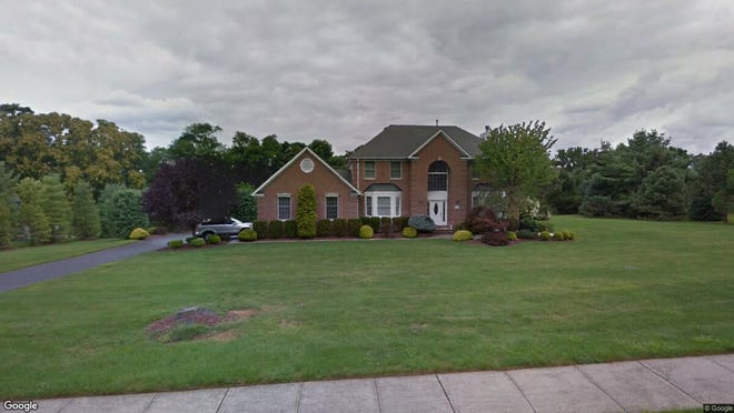 This Google Street View image shows the approximate location of 165 Sheffield Drive in Freehold Township. The property at this address changed hands in September 2019, when new owners bought the property for $687,500.