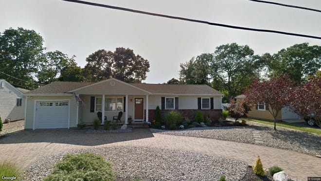 This Google Street View image shows the approximate location of 130 Club House Road in Brick. The property at this address changed hands in September 2019, when new owners bought the property for $329,750.