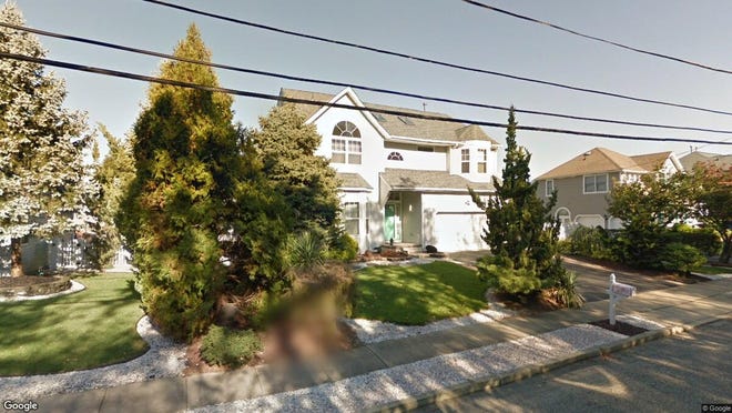 This Google Street View image shows the approximate location of 14 Cedar Island Drive in Brick. The property at this address changed hands in September 2019, when new owners bought the property for $475,000.