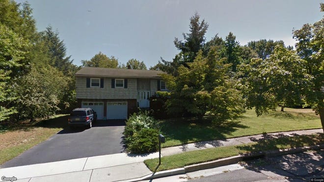 This Google Street View image shows the approximate location of 4 Revock Road in East Brunswick. The property at this address changed hands in October 2019, when new owners bought the property for $390,000.