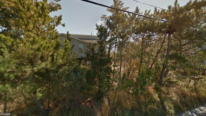 This Google Street View image shows the approximate location of 1123A Long Beach Blvd. in Long Beach Township. The property at this address changed hands in October 2019, when new owners bought the property for $860,000.