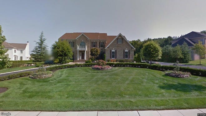 This Google Street View image shows the approximate location of 20 Elkridge Way in Manalapan. The property at this address changed hands in November 2019, when new owners bought the property for $1,100,000.