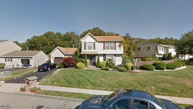 This Google Street View image shows the approximate location of 2 Iris Court in Howell. The property at this address changed hands in December 2019, when new owners bought the property for $385,000.