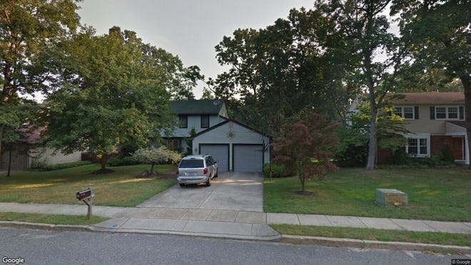 This Google Street View image shows the approximate location of 303 Candlewood Lane in Mount Laurel. The property at this address changed hands in November 2019, when new owners bought the property for $369,900.
