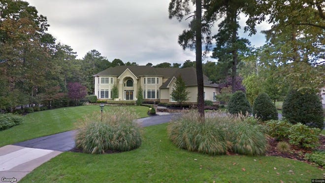 This Google Street View image shows the approximate location of 12 Brookwood Drive in Medford. The property at this address changed hands in November 2019, when new owner bought the property for $965,000.