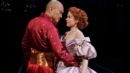 In this image released by the Lincoln Center Theater, Kelli O'Hara, right, and Ken Watanabe appear during a performance of "The King and I," in New York. (AP Photo/Lincoln Center Theater, Paul Kolnik)