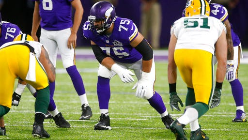 FILE - In this Sept. 18, 2016, file photo, Minnesota Vikings tackle Matt Kalil (75) gets set for a play during the first half of an NFL football game against the Green Bay Packers in Minneapolis. The Panthers have agreed to terms on a five-year contract with free agent offensive tackle Matt Kalil from the Vikings. He will be paired with his older brother Ryan Kalil, who is a two-time All-Pro center for the Panthers.