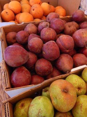 Pears from the Ha’s Apple stand at the downtown Ventura farmers market can be added to traditional cranberry sauce for a different flavor. Or just poach them and offer them as another side dish.