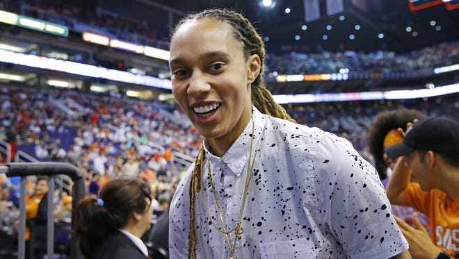 WNBA's Brittney Griner was all smiles after signing a new contract prior to the Phoenix Suns NBA game Sunday, Mar. 12, 2017 in Phoenix, Ariz.