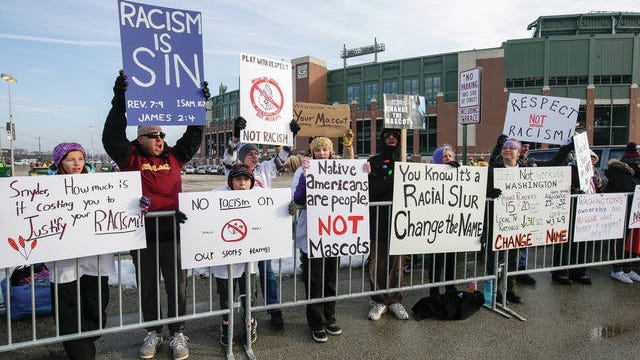 Protesters demonstrate against the Washington Redskins' name outside Lambeau Field before a game between the Green Bay Packers and Washington last season.