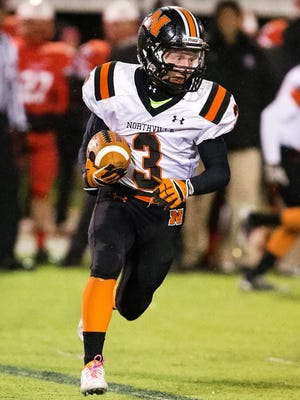 Northville's Zach Prystash tries to run the jet-sweep in Friday's 48-7 loss to Canton.