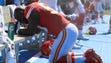 Justin Houston of the Chiefs takes a knee during the