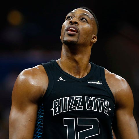 Charlotte Hornets center Dwight Howard looks on...