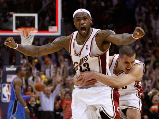 LeBron James #23 and Sasha Pavlovic #3 of the Cleveland
