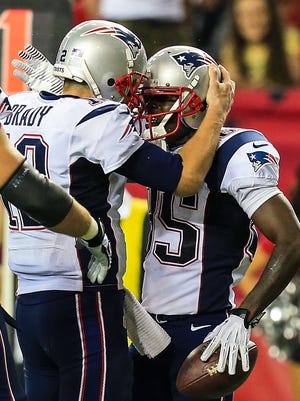 Tom Brady (12) found Kenbrell Thompkins (95) for six catches, 127 yards and a touchdown.