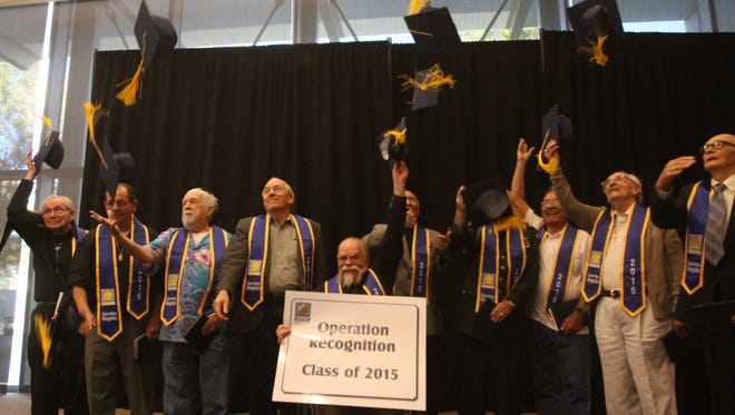 Veterans toss their caps up in the air after "graduating" during the 9th annual Operation Recognition Ceremony for veterans. Peña, who served in the Marine Corps, received a high school diploma at the Moreno Valley Conference and Recreation Center in Moreno Valley on November 10, 2015. 