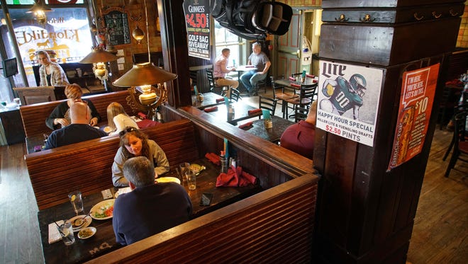 Patrons dine at Klondike Kate's  on Main Street in Newark.