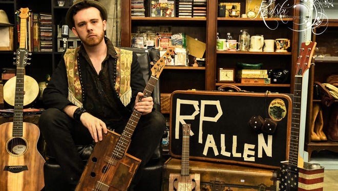 Dylan Allen crafts instruments out of found cans and wood.