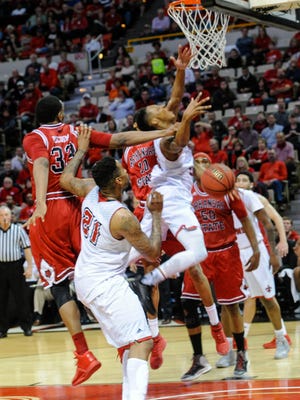 Jay Wright draws the foul in UL's win over Arkansas State on Thursday night. Feb 11, 2016.
