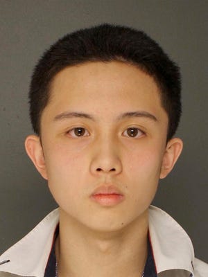 FILE - In this undated photo provided by the Upper Darby Police Department in Upper Darby, Pa., shows An Tso Sun, a Taiwanese exchange student charged with making terroristic threats after he was arrested for threatening a shooting at his high school, Monsignor Bonner and Archbishop Prendergast Catholic High School in Drexel Hill, Pa. Police said Wednesday, March 28, 2018, that Sun had researched how to buy weapons, and that a military-style ballistic vest, ammunition clip pouches, a high-powered crossbow and live ammunition were found in his bedroom in Lansdowne, Pa. Sun is in custody in Delaware County Prison in Thornton, Pa., in lieu of $100,000 bail. (Upper Darby Police Department via AP)
