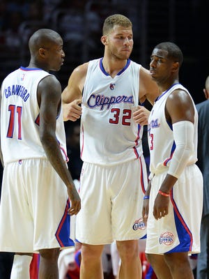 Jamal Crawford (11) had 16 points, Blake Griffin (32) had 23 and Chris Paul (3) had 22 in the Clippers' season-opening win.