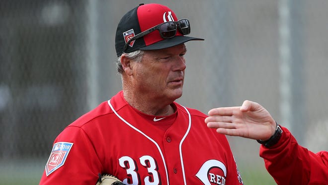 Louisville Bats manager Pat Kelly, left, talks with Cincinnati Reds manager Bryan Price (38), Friday, Feb. 16, 2018, at the Cincinnati Reds Spring Training facility in Goodyear, Arizona.
