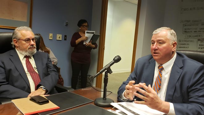 Former House Speaker Larry Householder, R-Glenford, (right) was joined by House Bill 6 co-sponsor Rep. Jamie Callender, R-Concord, to discuss the legislation with reporters after it was introduced in 2019. [Jim Siegel]/Dispatch]