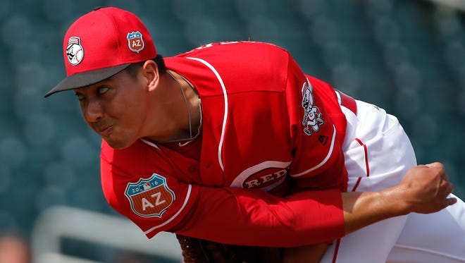 Reds pitcher Robert Stephenson follows through on a pitch in the first inning during a March 2 Cactus League game against the Cleveland Indians.