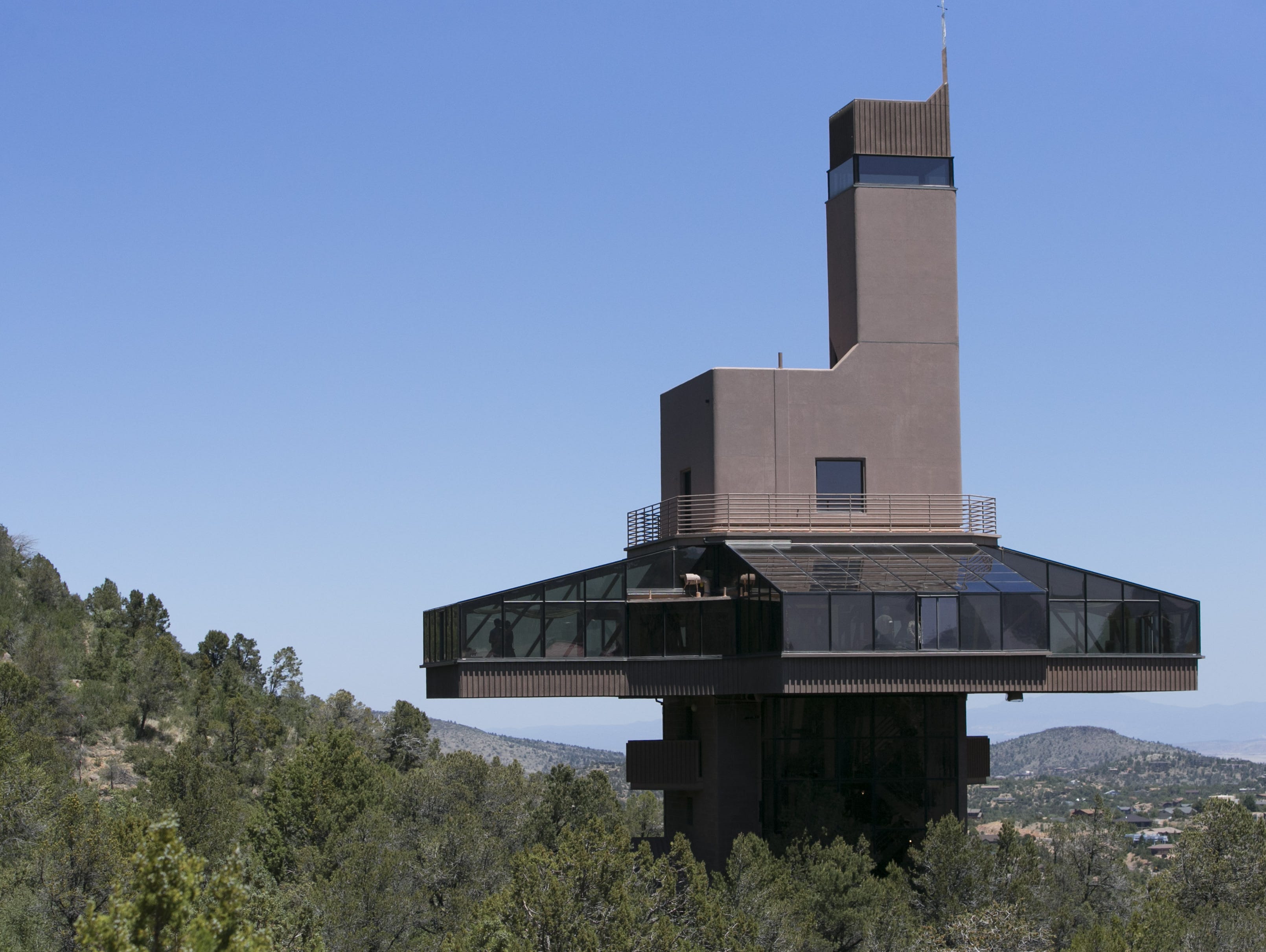 Billed as the world's tallest home at 124 feet tall, this 6,200-square-foot home is on the east side of Tom's Thumb in Prescott.