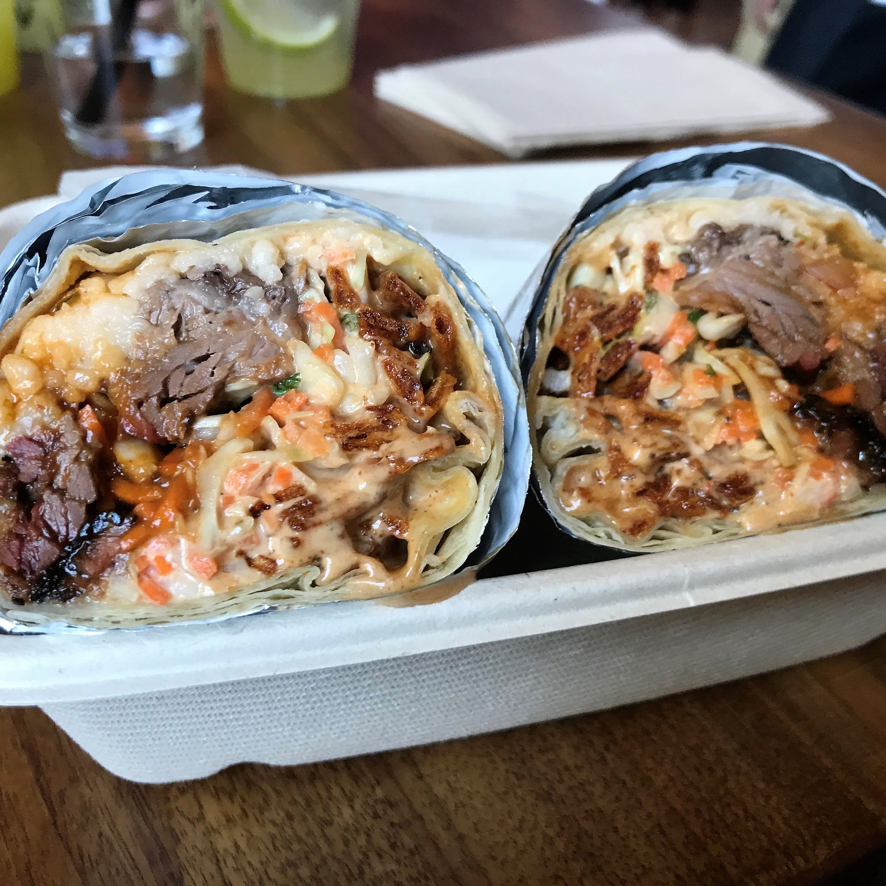 The exceptional burnt ends burrito is stuffed with authentic beef brisket burnt ends, chipotle cole slaw, manchego cheese and crunchy fried potato strings.