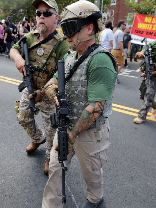 Armed militias increasingly joining protests