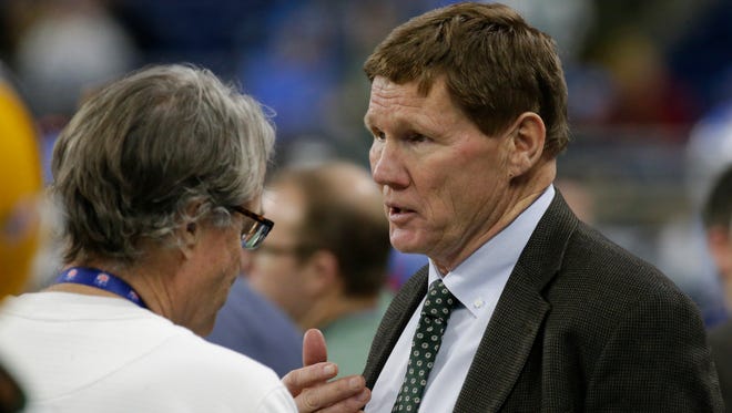Green Bay Packers president Mark Murphy (right) talks with associate team physician John Gray before their game against the Detroit Lions on Dec. 31, 2017, at Ford Field in Detroit.